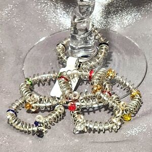 Set of six wine glass charms